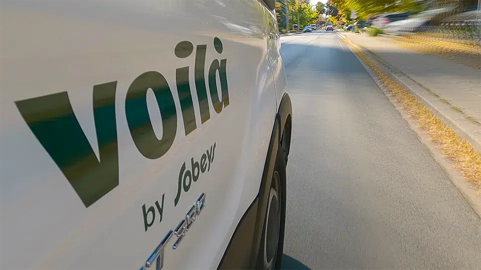 Screenshot from a Corporate Recruitment video. A Volia truck on the move.