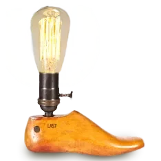 Wooden shoe last with lightbulb